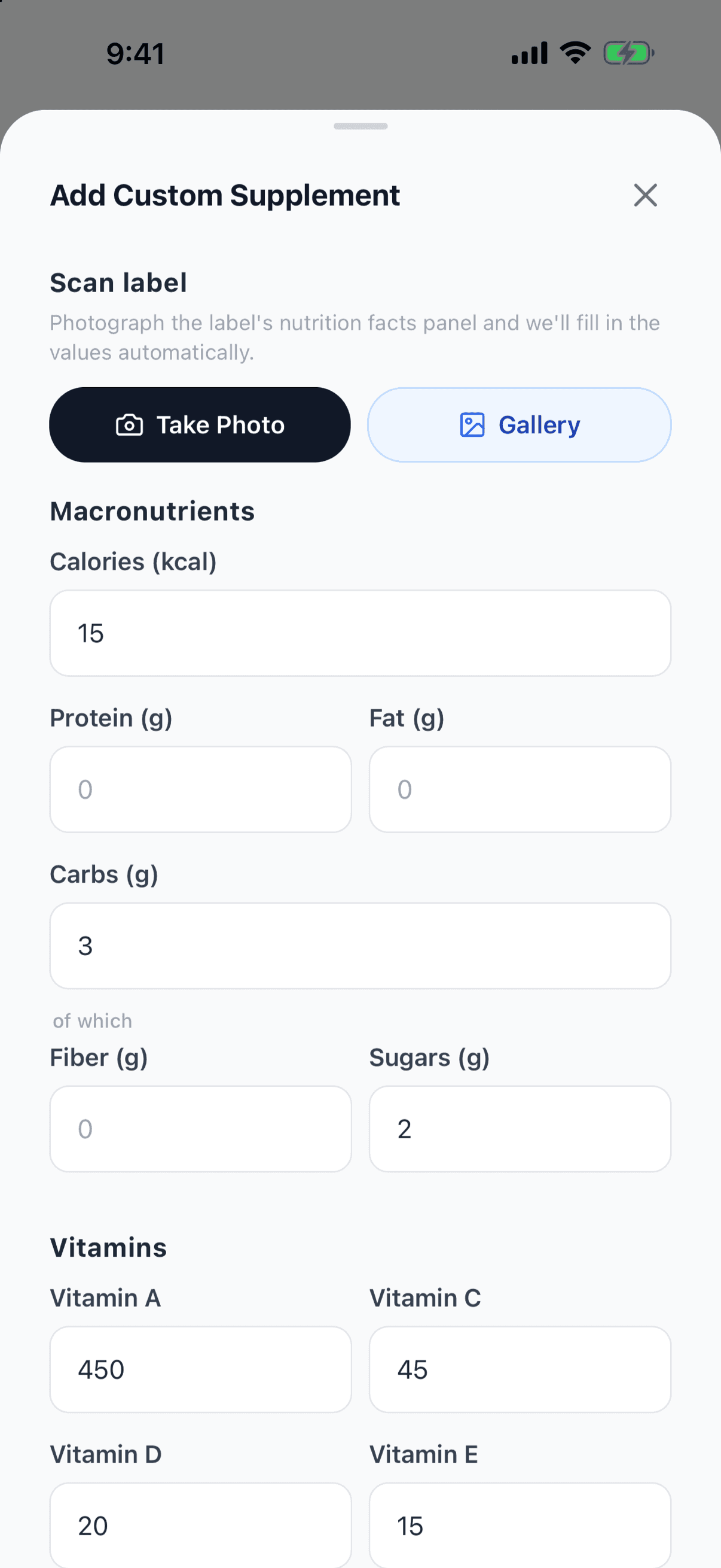 The “Add custom supplement” form after scanning a label: 15 kcal, 3 g of carbohydrates, 2 g of sugars and vitamins A (450), C (45), D (20) and E (15) already filled in